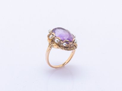 14K rose gold ring (585 ‰) adorned with an...