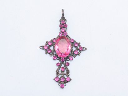 Metal cross pendant set with faceted pink...