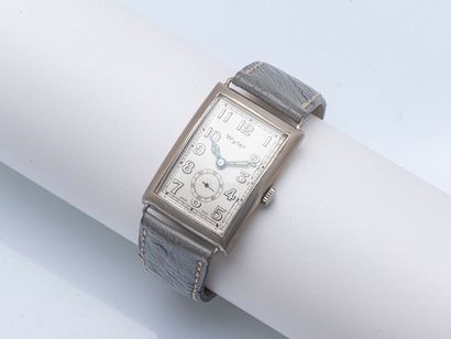 WYLER
Rectangular watch, curved steel case...