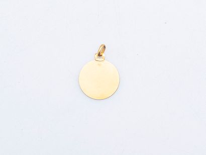 Pendentif médaille en or jaune 18 carats...