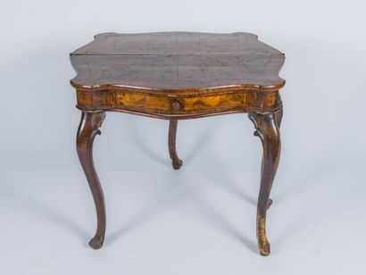 Burr veneer console table opening with a...