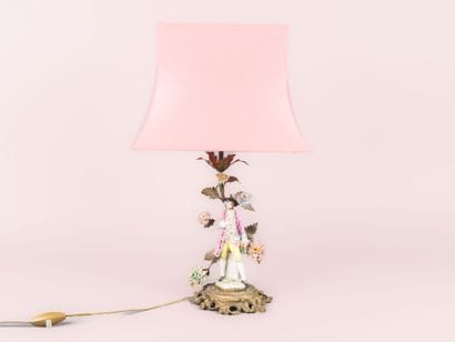 Gilt bronze lamp with porcelain subject in...