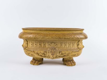 Jardinière en grès reposant sur pattes de...