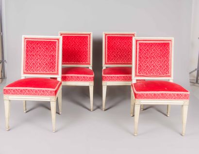 Pair of carved, white lacquered wood chairs...