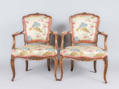 Pair of molded and carved wood armchairs...