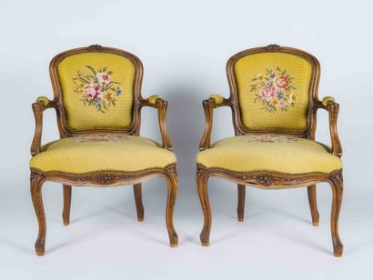 Pair of molded and carved wooden armchairs...