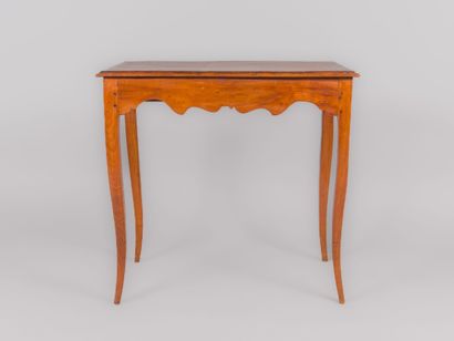 Molded and carved wood armchair on straight...