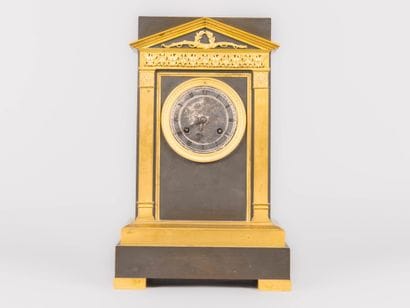 Chased bronze ormolu clock, the metal dial...