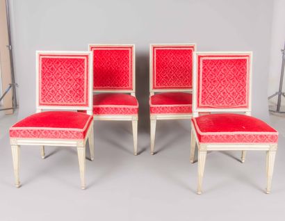 Pair of carved, white lacquered wood chairs...