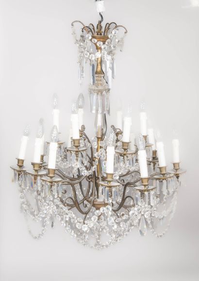 Large 18-light chandelier in patinated metal...