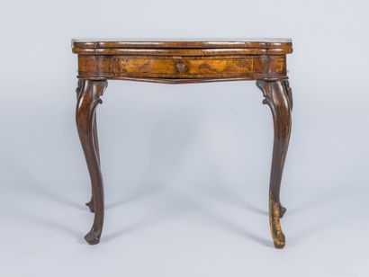 Burr veneer console table opening with a...