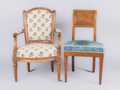 Molded and carved wood armchair on straight...