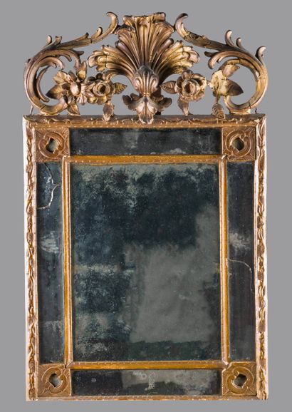 Miroir à parecloses dans un encadrement en...