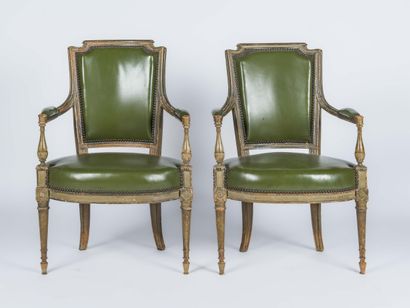 Pair of molded and carved green lacquered...