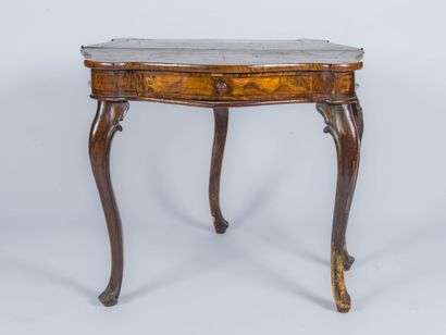 Burr veneer console table opening with a...