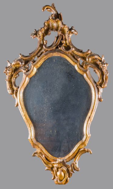 Miroir au mercure dans un cadre en bois doré...