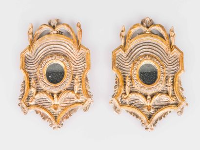 Paire de petits miroirs ovales dans des cadres...