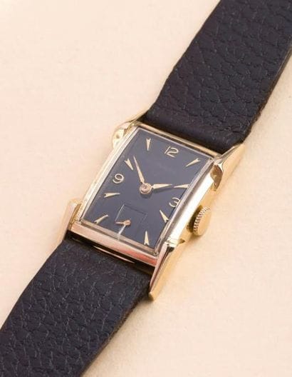 WITTNAUER
(BRANCARD - OR JAUNE N° 75917),...