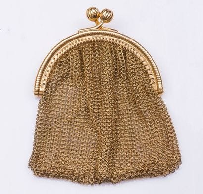 Porte-monnaie arrondi en or jaune 18 carats...