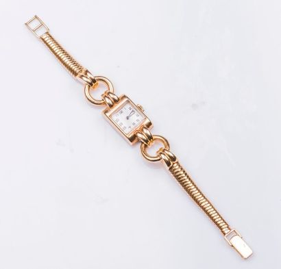 Bracelet montre de femme en or jaune 18 carats...