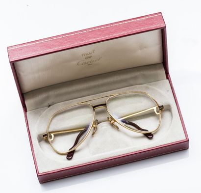 MUST de CARTIER
Paire de lunette Must plaquée...