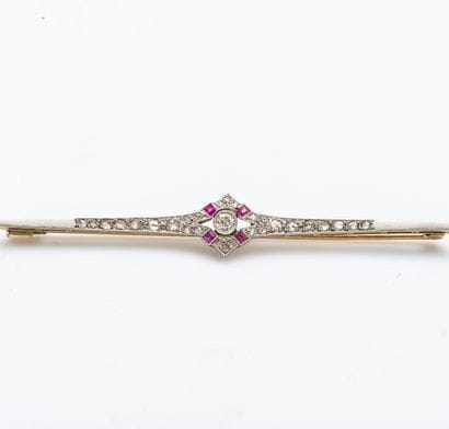 Broche barrette en or jaune et en or gris...