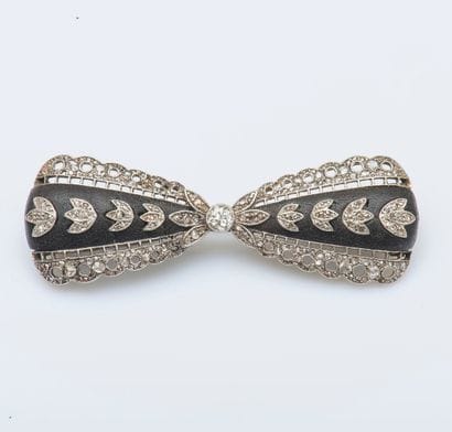 Broche nœud en platine (950 millièmes) et...