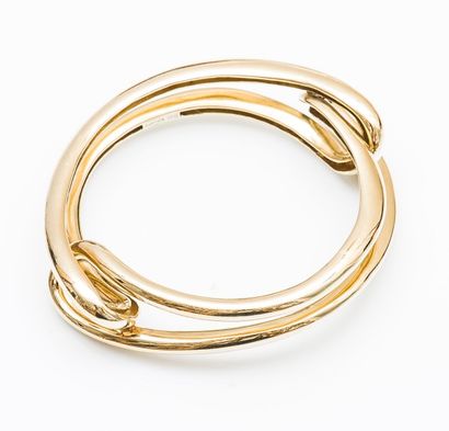 CARTIER

Bracelet double jonc rigide en or...
