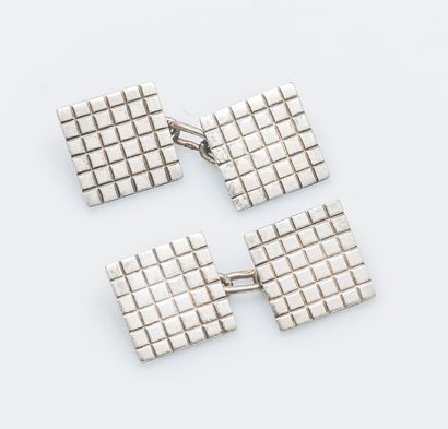 Paire de boutons de manchettes en argent...