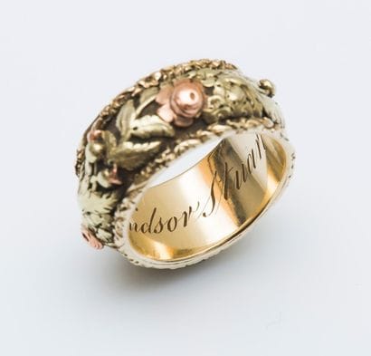Anneau bombé en or jaune et or rose 14 carats...