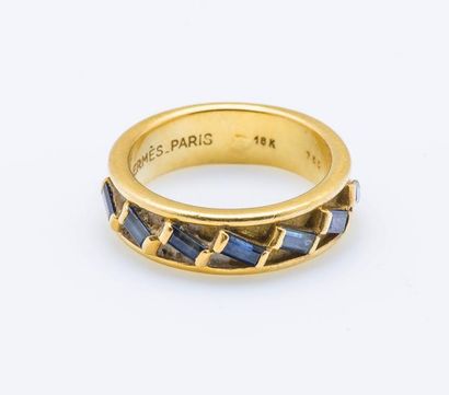 HERMÈS
Bague jonc plat en or jaune 18 carats...