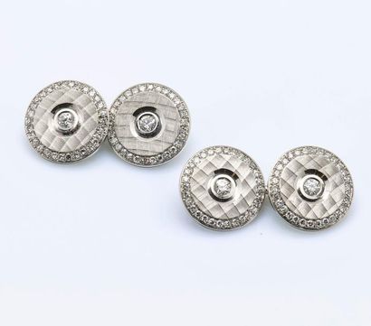 Paire de boutons de manchettes ronds en or...