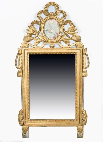 Trumeau en bois sculpté et doré à décor de...