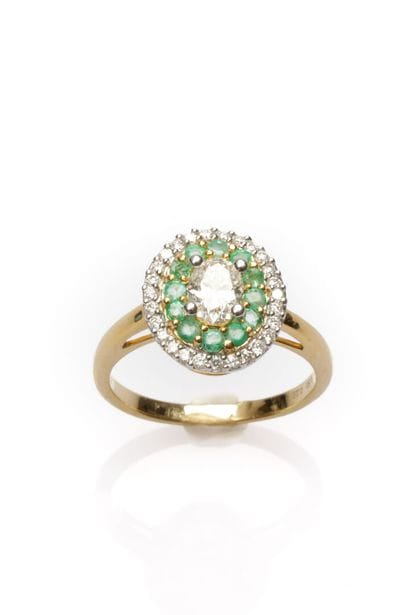 18K yellow gold ring set with a 0.50 carat...