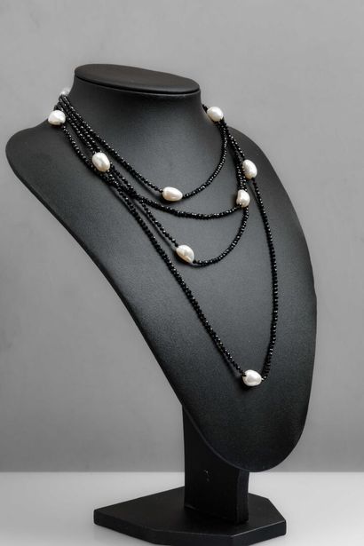 Joli Sautoir de perles d'eau douces 8-9 mm...