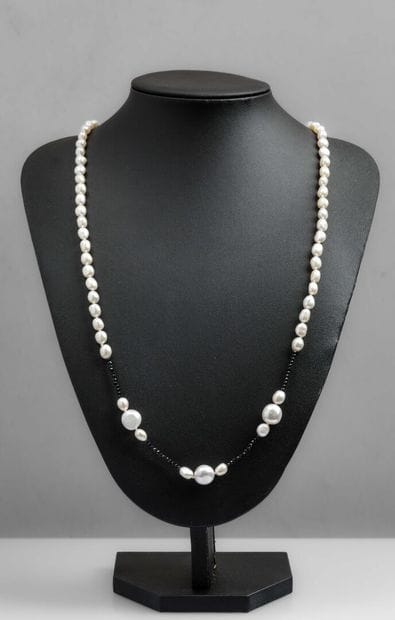 Sautoir of 6-7 mm freshwater pearls and black...