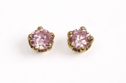 Pair of ear studs in 18K yellow gold adorned...
