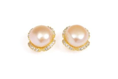 Pair of gilded steel ear studs adorned with...
