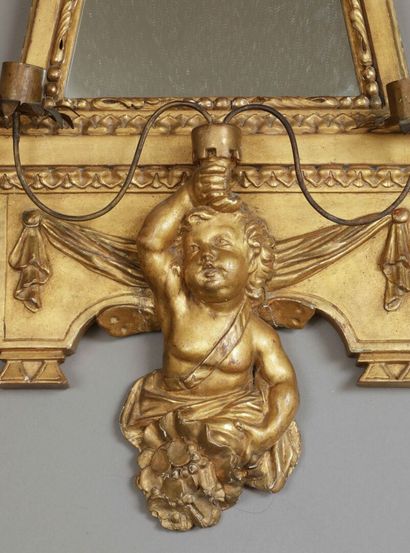 Gilded wood mirror carved with a dolphin...