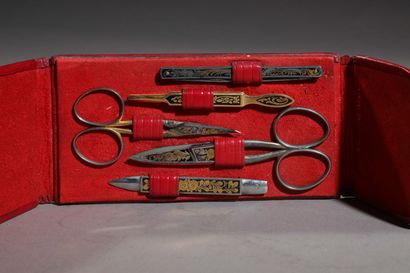 Kindall
Manicure set in red leather case...