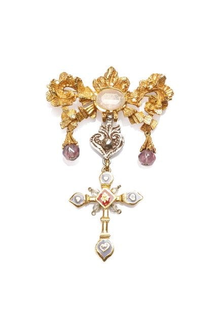 Christian LACROIX
Gilded metal cross brooch...
