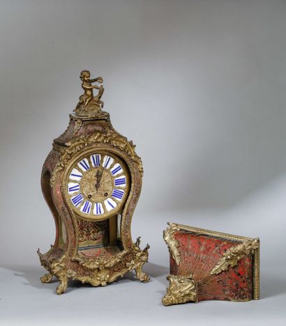 Carved brass and tortoiseshell marquetry...