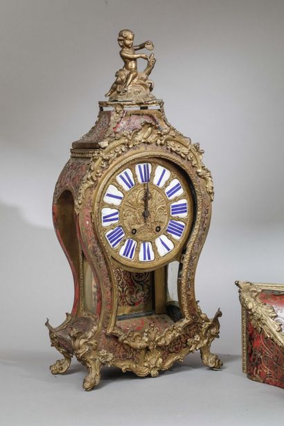 Carved brass and tortoiseshell marquetry...