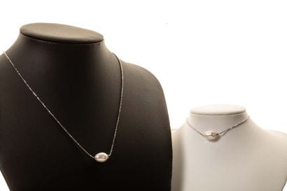 Set consisting of a silver necklace and bracelet...