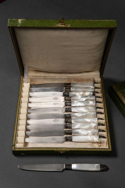 Set of 11 table knives and 12 dessert knives...