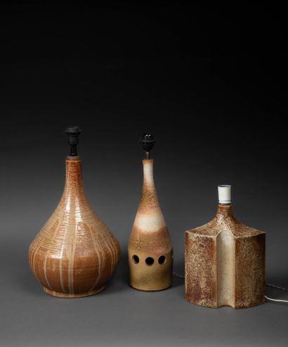 Suite of three large glazed ceramic lamps...