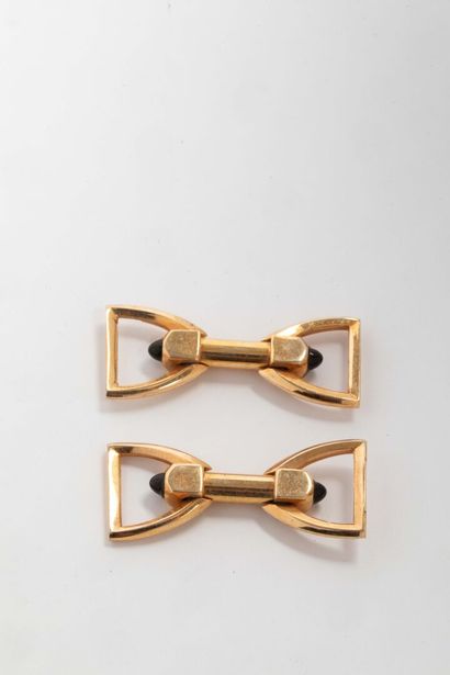 Pair of cufflinks with gilded metal stirrup...