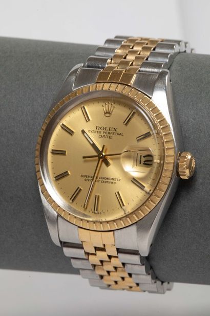 ROLEX - Oyster Perpetual Date. 
Stainless...