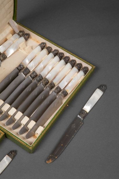Set of 11 table knives and 12 dessert knives...