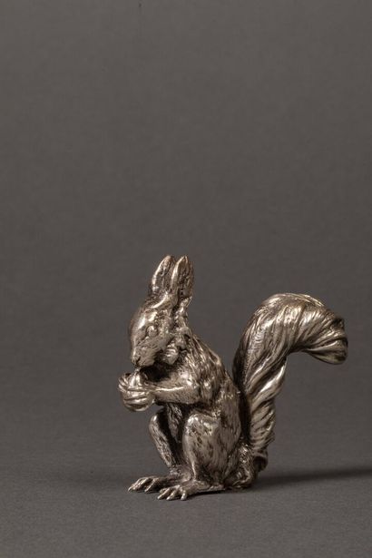 Silver squirrel holding a hazelnut.
Weight:...